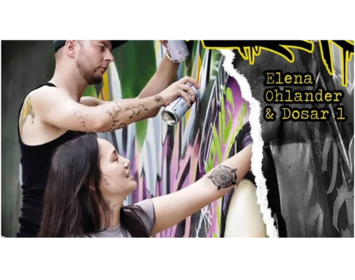 Mann und Frau sprayen ein Wandbild